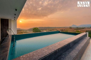 StayVista at Majestic Whispers with Rooftop Pool